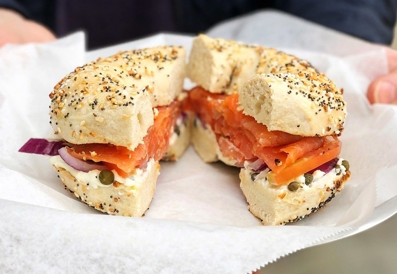 The famous ET bagel served with Nova lox, cream cheese, tomato, red onion and capers — yum! Everything bagel sandwich with salmon