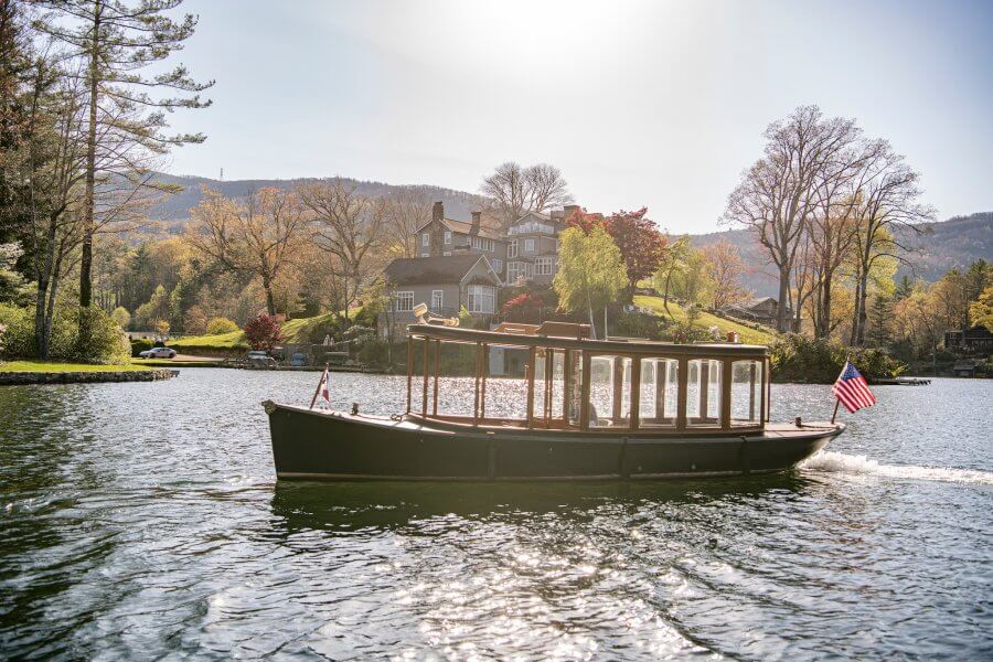 Miss Lucy wooden boat on Lake Toxaway in North Carolina