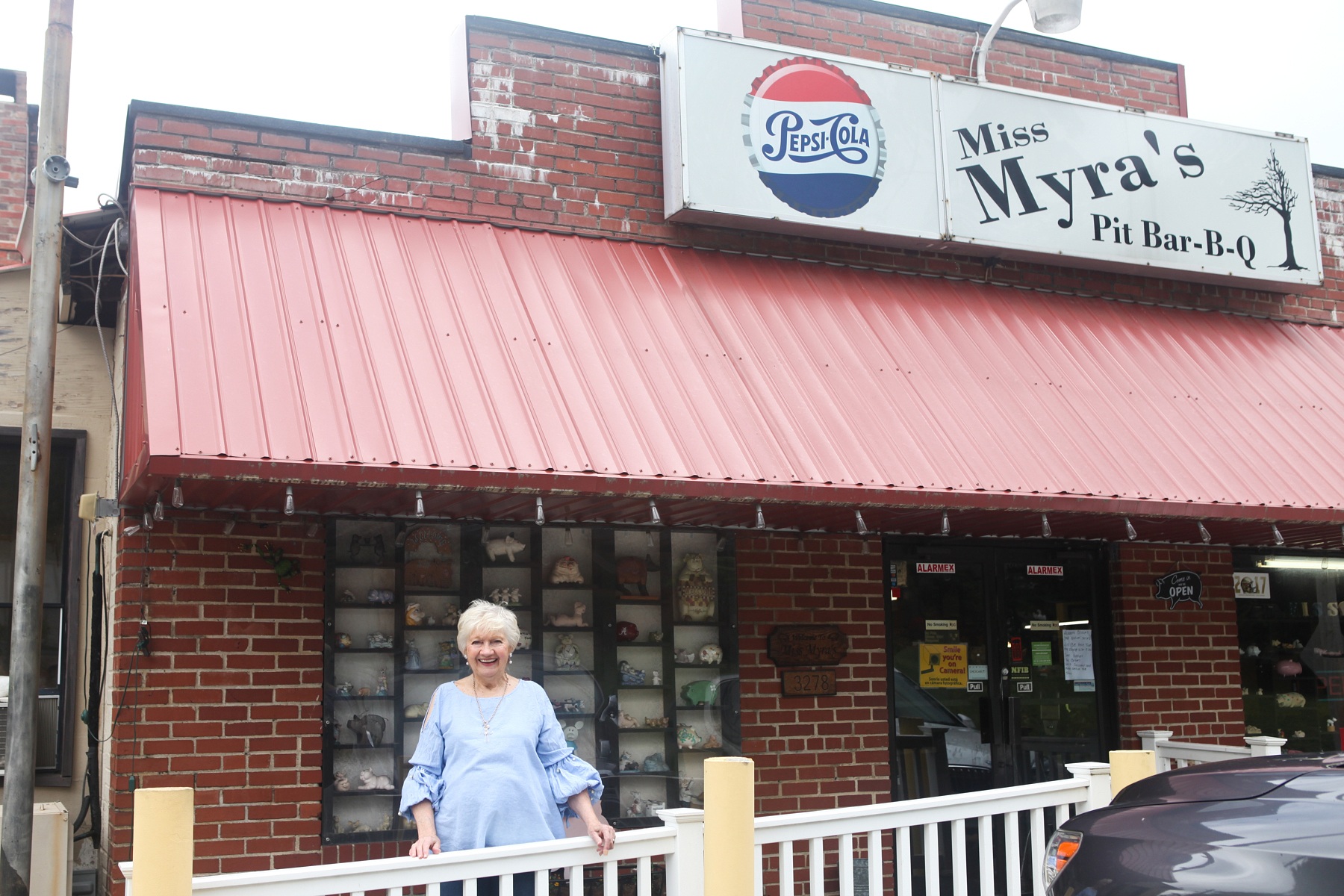 Myra Grissom Harper, a.k.a. "Miss Myra" of Miss Myra’s Pit Bar-B-Q stands proudly before her pit Bar-B-Q joint in Cahaba Heights. Myra Grissom Harper, a.k.a. "Miss Myra" of Miss Myra’s Pit Bar-B-Q stands proudly before her pit Bar-B-Q joint in Cahaba Heights.