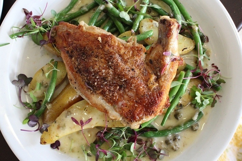 This gorgeous chicken dish is almost too pretty to eat! Fried chicken on greens