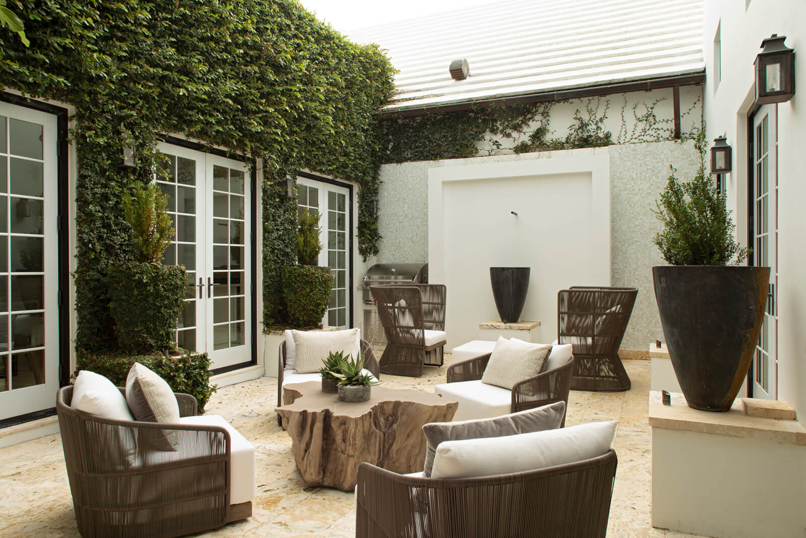 A home courtyard with ivy-covered walls