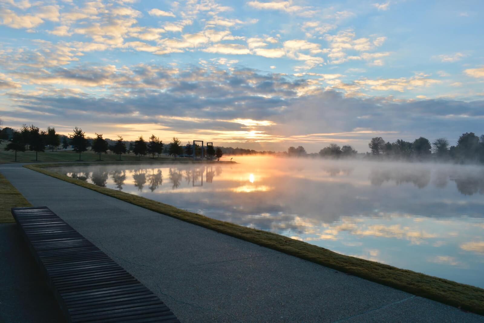 lakeside paved trail at sunset