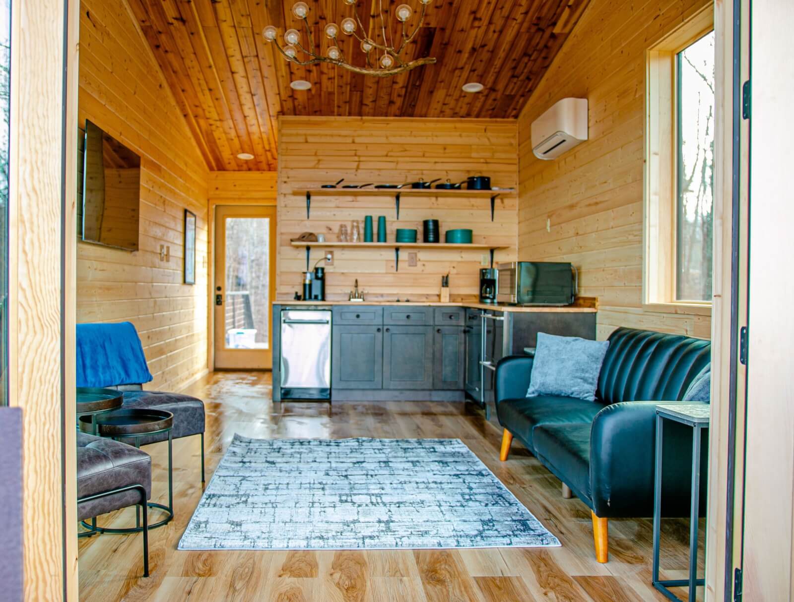 View of living room/kitchen areas from porch.